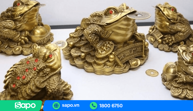 Cóc ngậm tiền xu thu hút lộc kinh doanh cho gia chủ